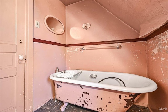 bathroom featuring a tub to relax in