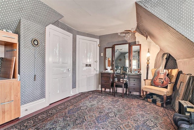 living area featuring ceiling fan