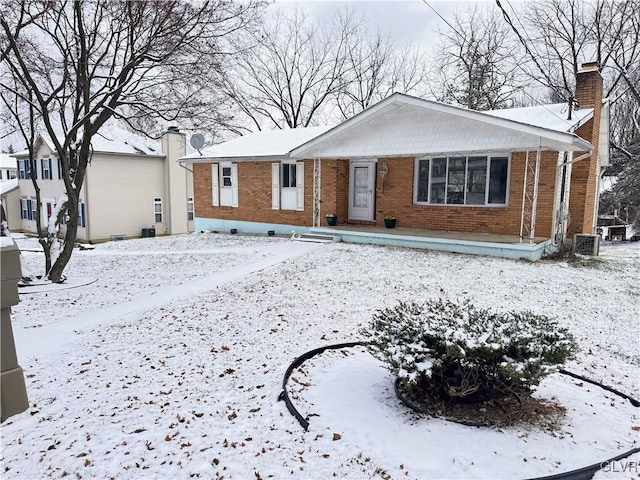 single story home with central air condition unit