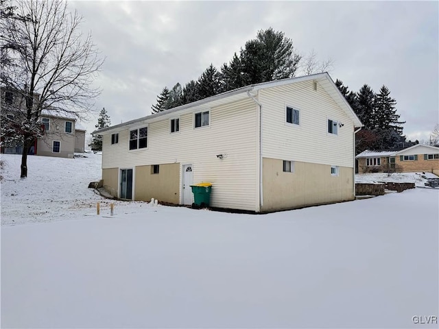 view of snow covered property