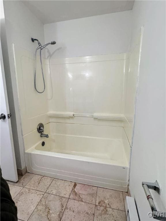 bathroom with tub / shower combination