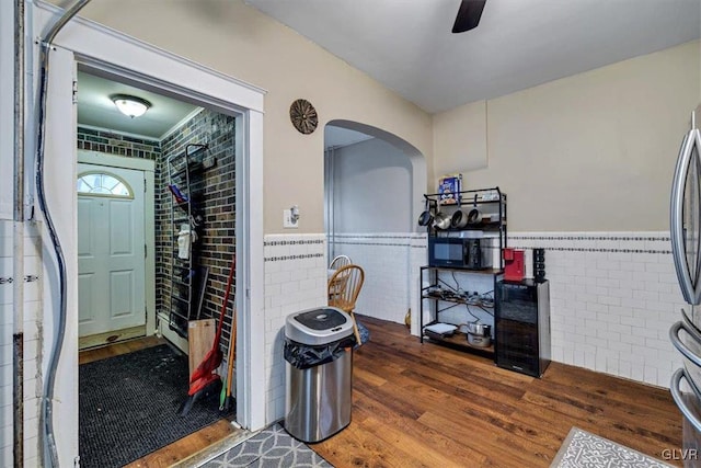 interior space featuring ceiling fan