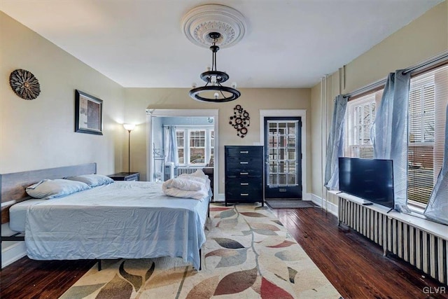 bedroom featuring dark wood-type flooring