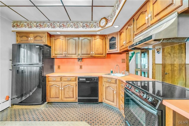 kitchen with black appliances and sink