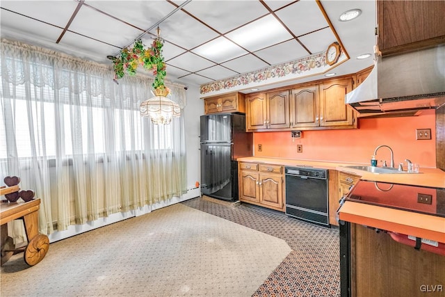 kitchen with tile patterned floors, sink, black appliances, and a baseboard radiator