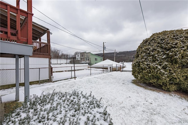 view of yard covered in snow