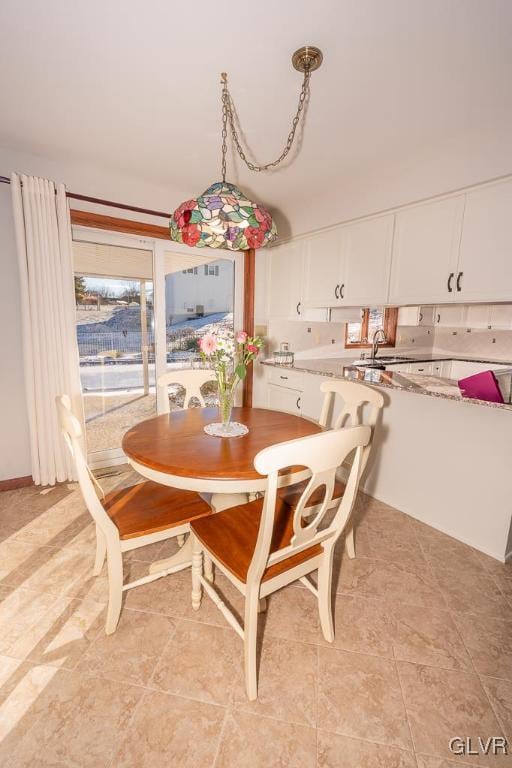 dining area with sink