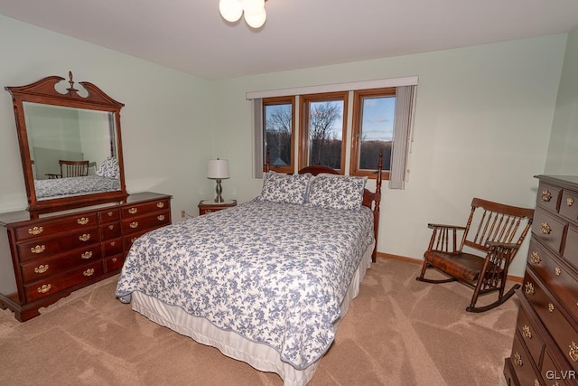 bedroom with light colored carpet