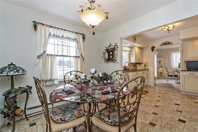 dining area featuring sink