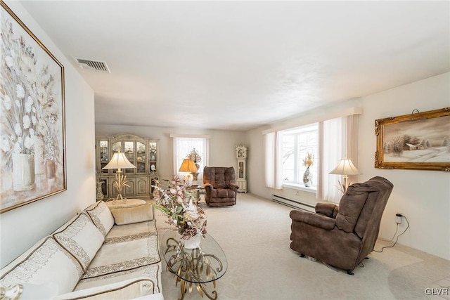 carpeted living room featuring baseboard heating