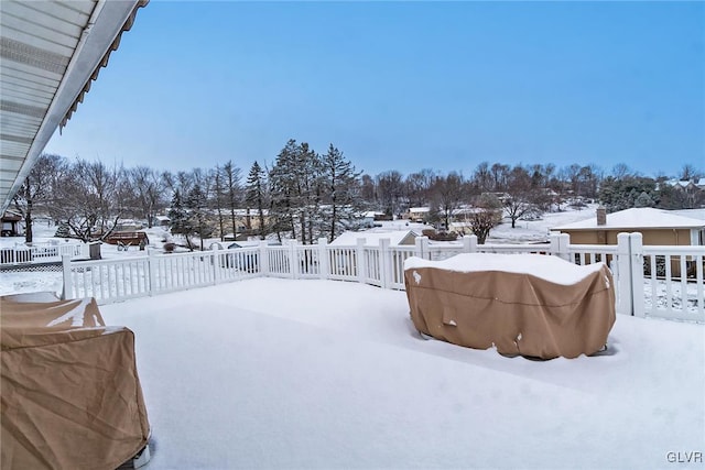 view of yard layered in snow