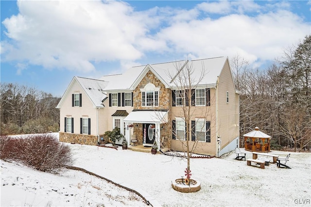 view of front of house with stone siding