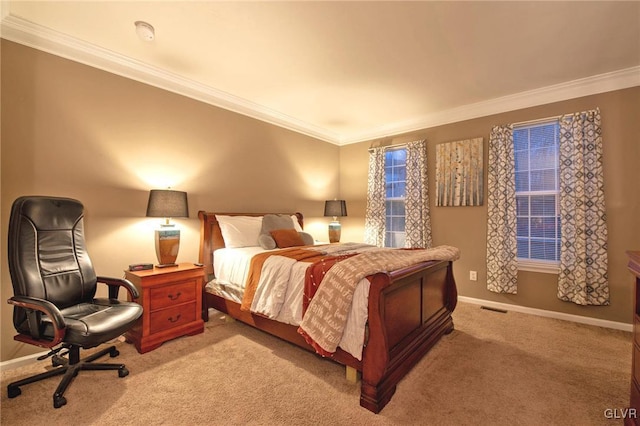 carpeted bedroom with baseboards, visible vents, and crown molding