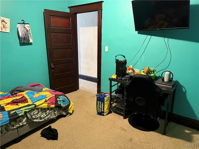 bedroom with light colored carpet