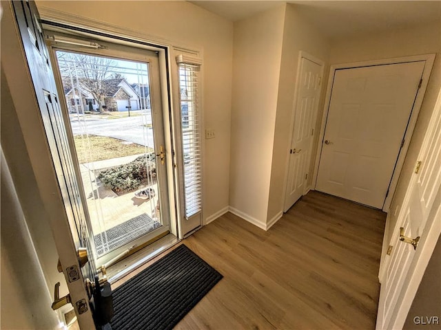 foyer entrance featuring light wood-type flooring