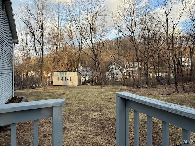 view of yard with a storage shed