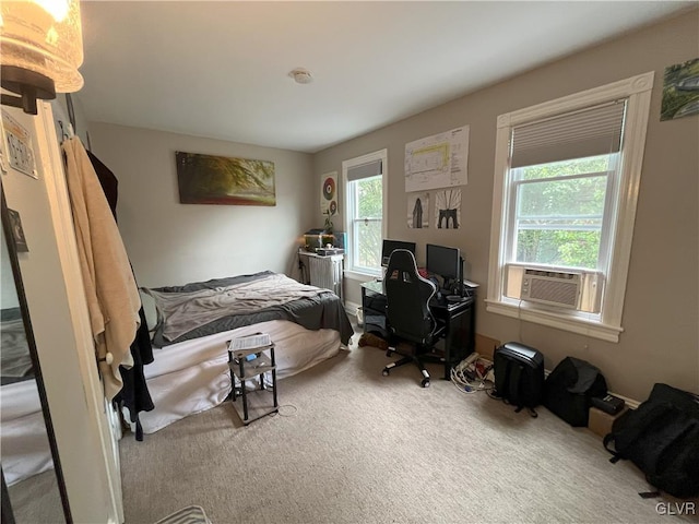 carpeted bedroom featuring cooling unit