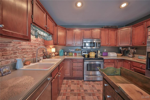 kitchen featuring stainless steel appliances and sink