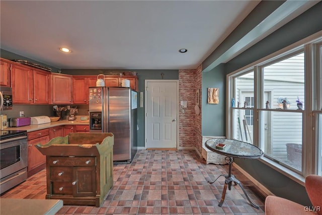 kitchen with a center island and appliances with stainless steel finishes