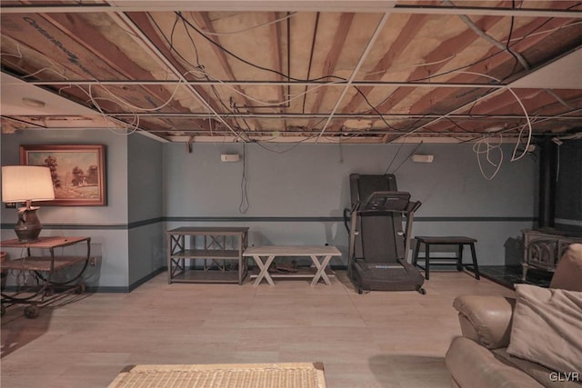 basement with wood-type flooring