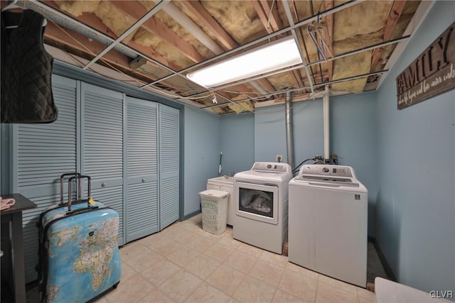 laundry room featuring separate washer and dryer