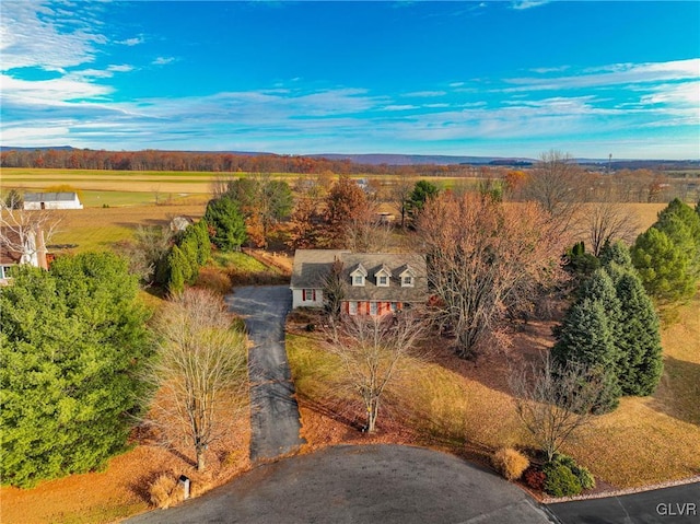 birds eye view of property featuring a rural view