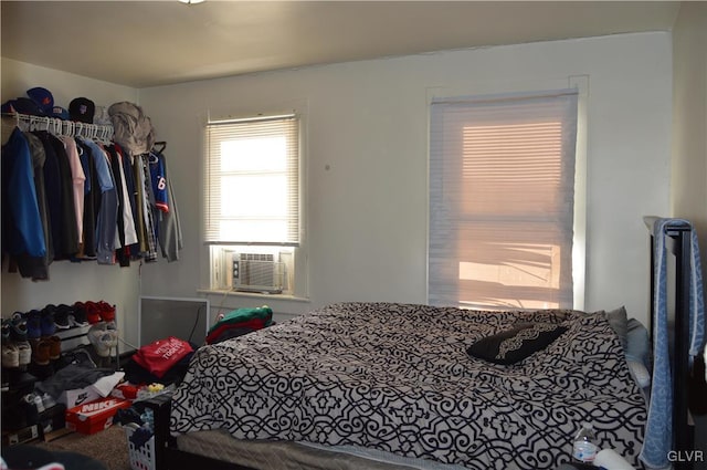 bedroom featuring cooling unit