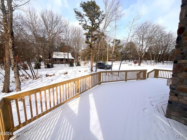 view of snow covered deck