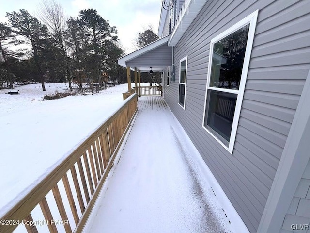 view of snow covered deck