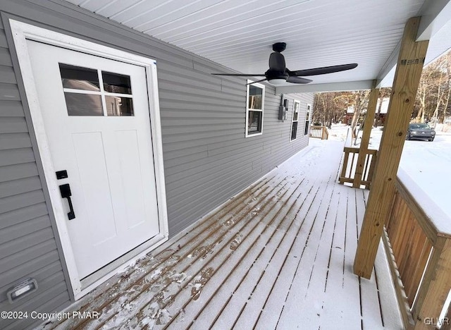 snow covered deck with ceiling fan