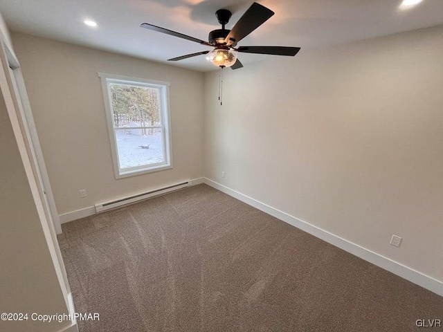 carpeted spare room featuring ceiling fan and a baseboard radiator