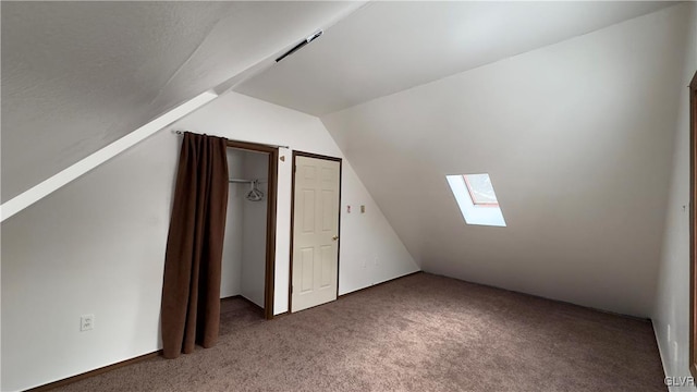 9860 Deerwood Dr, Coolbaugh Twp, PA 18466 - additional living space featuring a skylight, carpet flooring, and vaulted ceiling