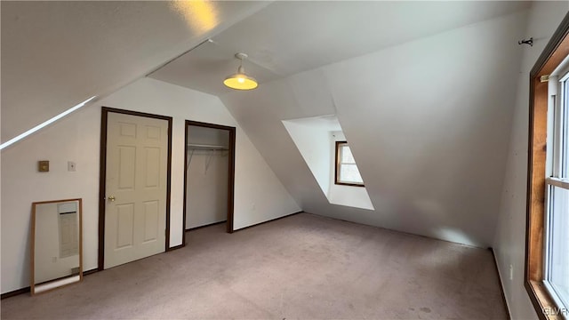 9860 Deerwood Dr, Coolbaugh Twp, PA 18466 - additional living space featuring light colored carpet, lofted ceiling, and a skylight