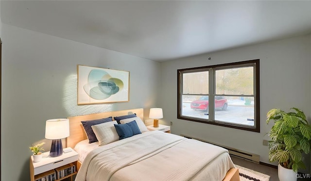 9860 Deerwood Dr, Coolbaugh Twp, PA 18466 - bedroom featuring a baseboard heating unit and carpet