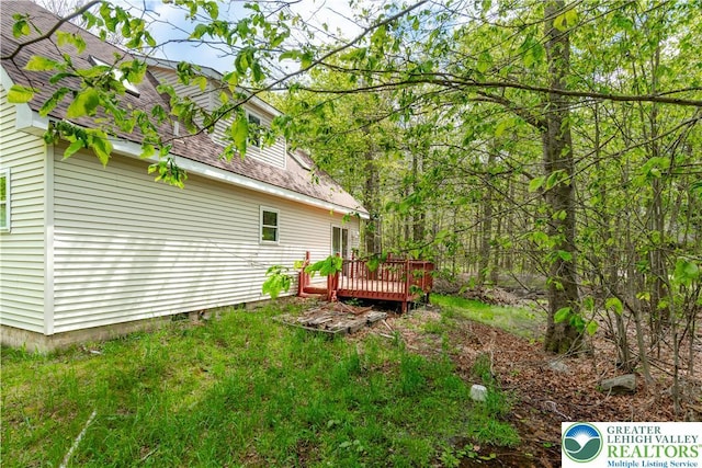 9860 Deerwood Dr, Coolbaugh Twp, PA 18466 - view of yard featuring a deck