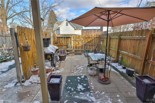 view of snow covered patio