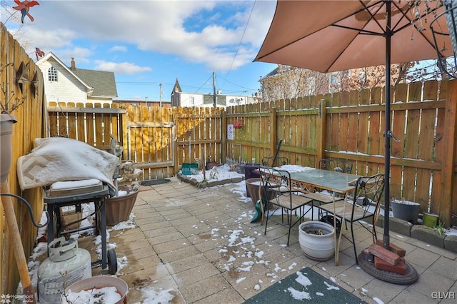 view of snow covered patio