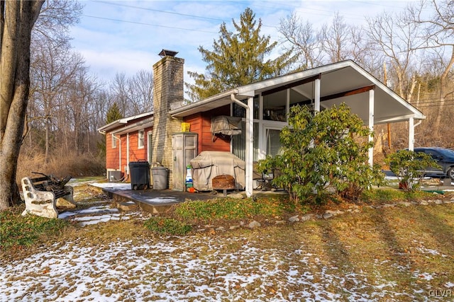 view of snow covered house