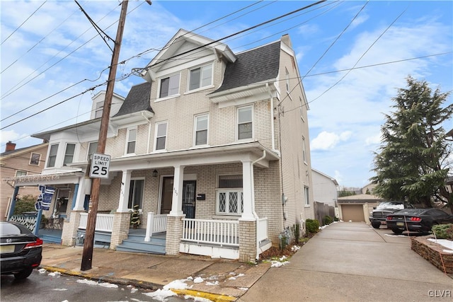 view of front of property featuring covered porch