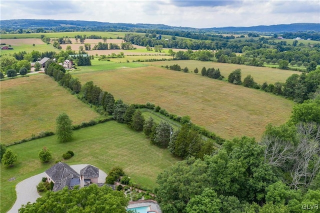 birds eye view of property featuring a rural view