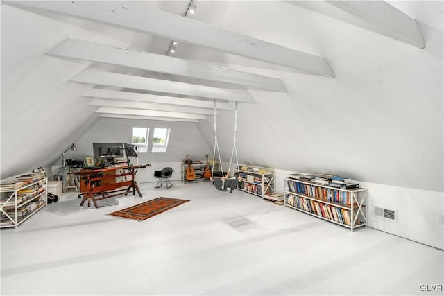 bonus room with vaulted ceiling with beams