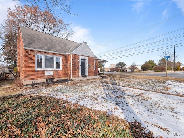 view of snow covered property