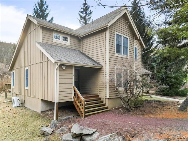 view of front of house with ac unit