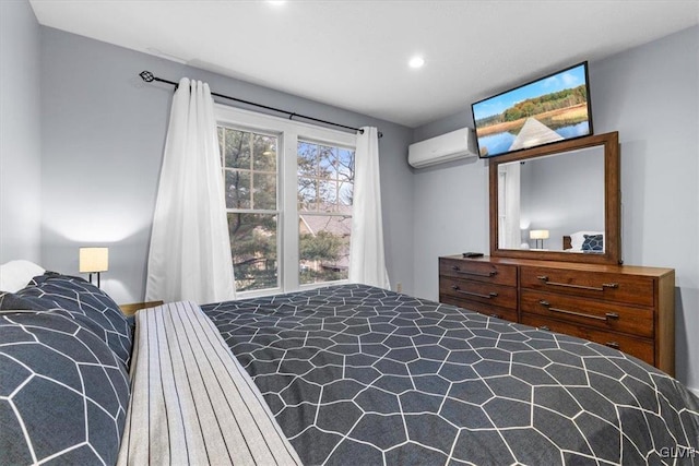 bedroom with a wall mounted air conditioner