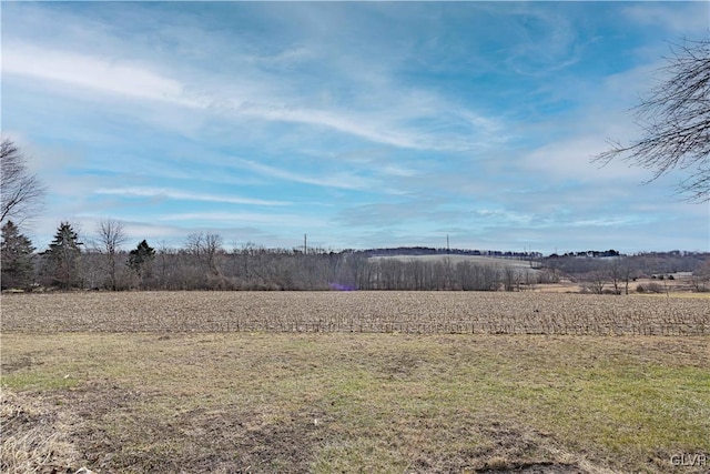 exterior space with a rural view