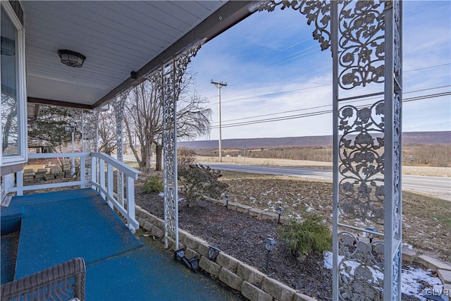 view of patio featuring a porch