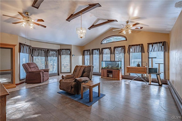 living room featuring a baseboard heating unit, dark wood-type flooring, ceiling fan with notable chandelier, and vaulted ceiling with beams