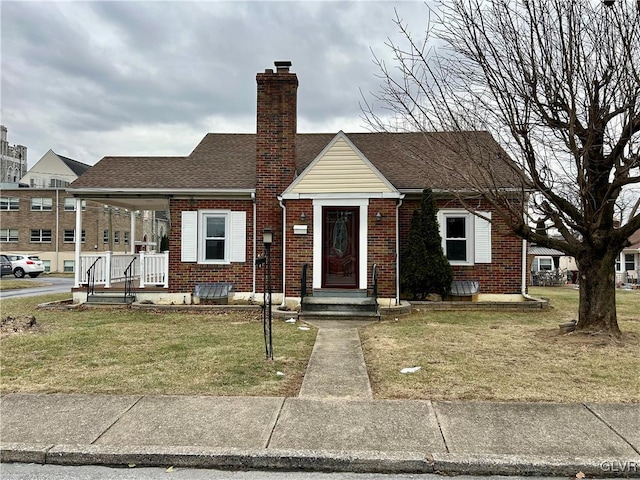 view of front of house featuring a front lawn and a porch