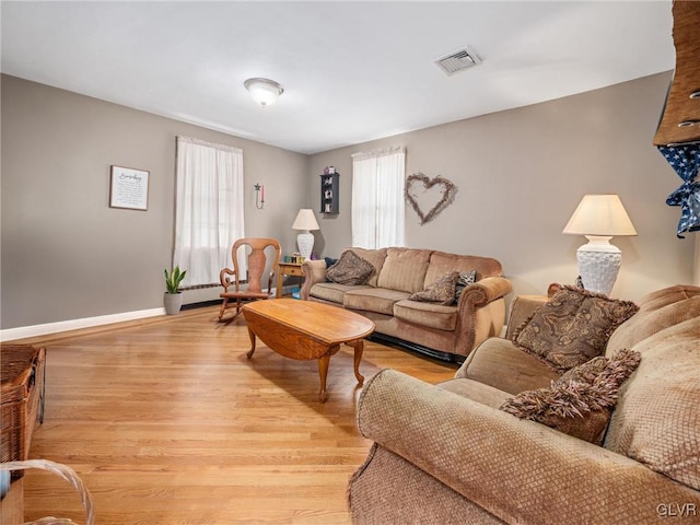 living room featuring light wood-type flooring