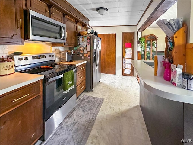 kitchen with decorative backsplash and stainless steel appliances